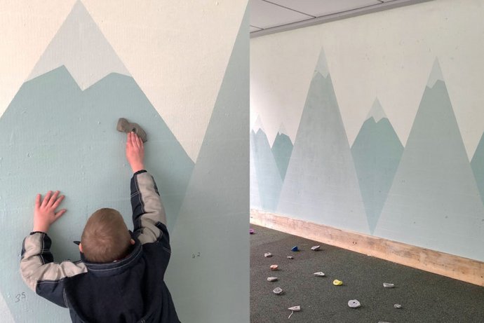 Kind an Kletterwand